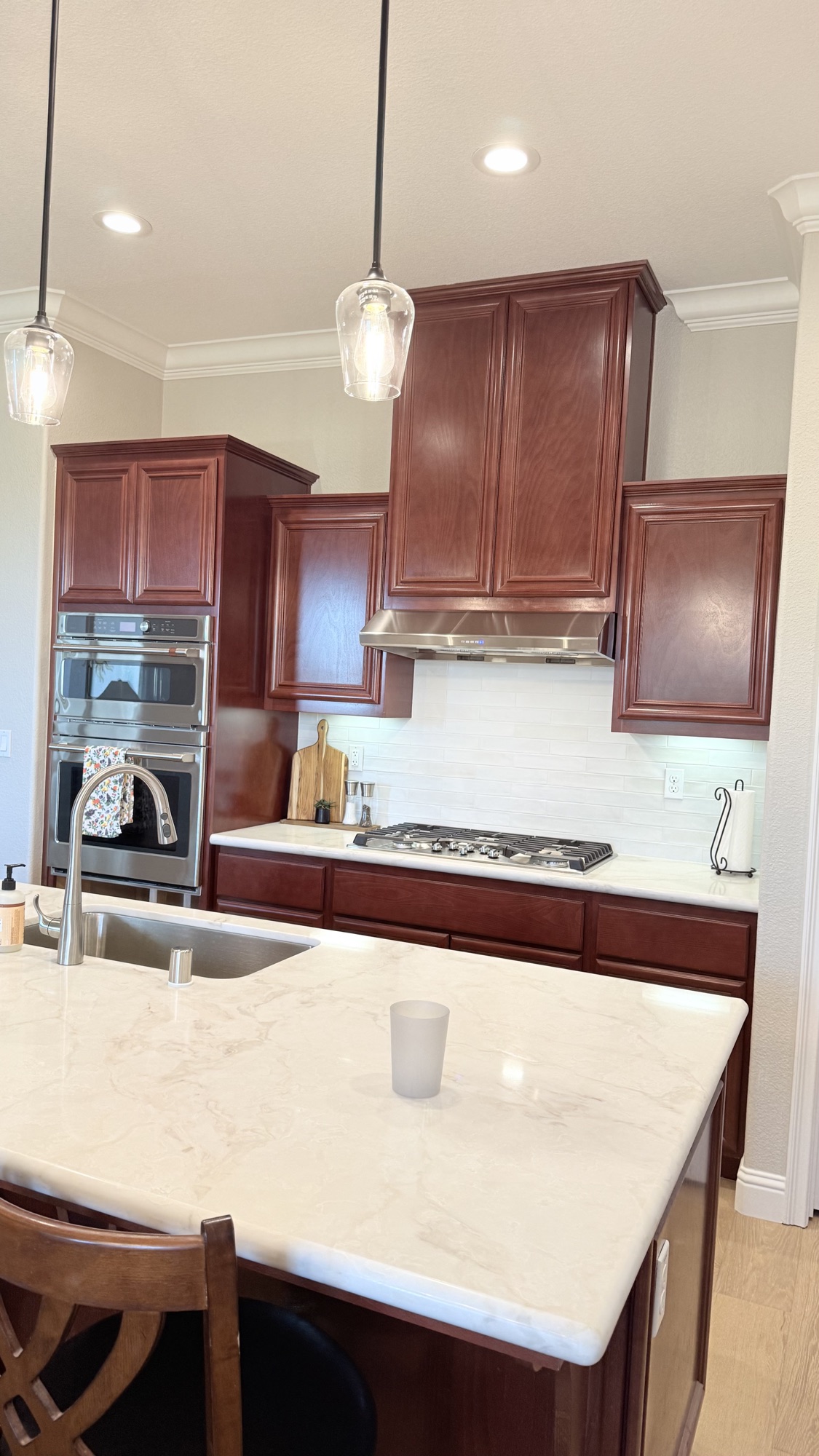 Updated kitchen island with light countertop after remodeling in El Dorado Hills