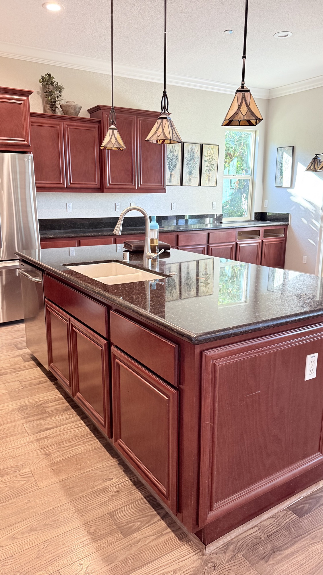 Original kitchen island and pendant lighting before an El Dorado Hills kitchen remodel